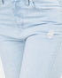 Light blue jeans with a slight distressed effect on a white background
