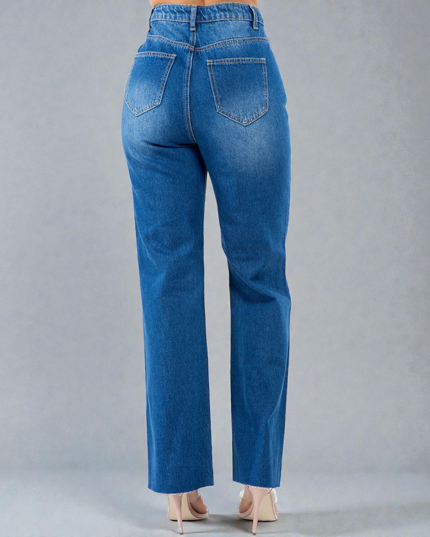 Blue jeans on a gray background