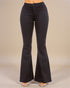 Black flared pants on a neutral background