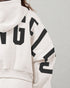 White hoodie with black text on a gray background