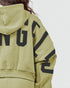 Green hoodie with black text on a plain background