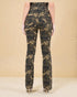Camouflage pants worn by a person on a beige background
