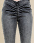 Gray jeans on a beige background