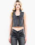 A woman modeling a sleeveless cropped denim vest in a faded black wash with a front zipper, paired with matching dark gray denim pants, against a plain white background.