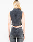 A woman shown from the back wearing a sleeveless dark gray washed denim vest and matching high-waisted denim jeans against a plain white background.