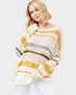 Woman wearing a striped sweater with yellow, gray, and white colors on a white background