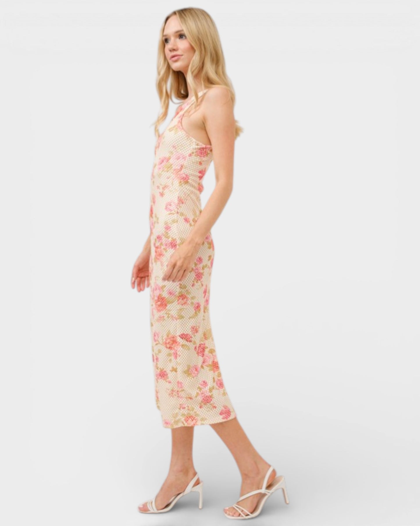 Woman wearing a floral dress on a white background