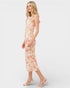 Woman wearing a floral dress on a white background