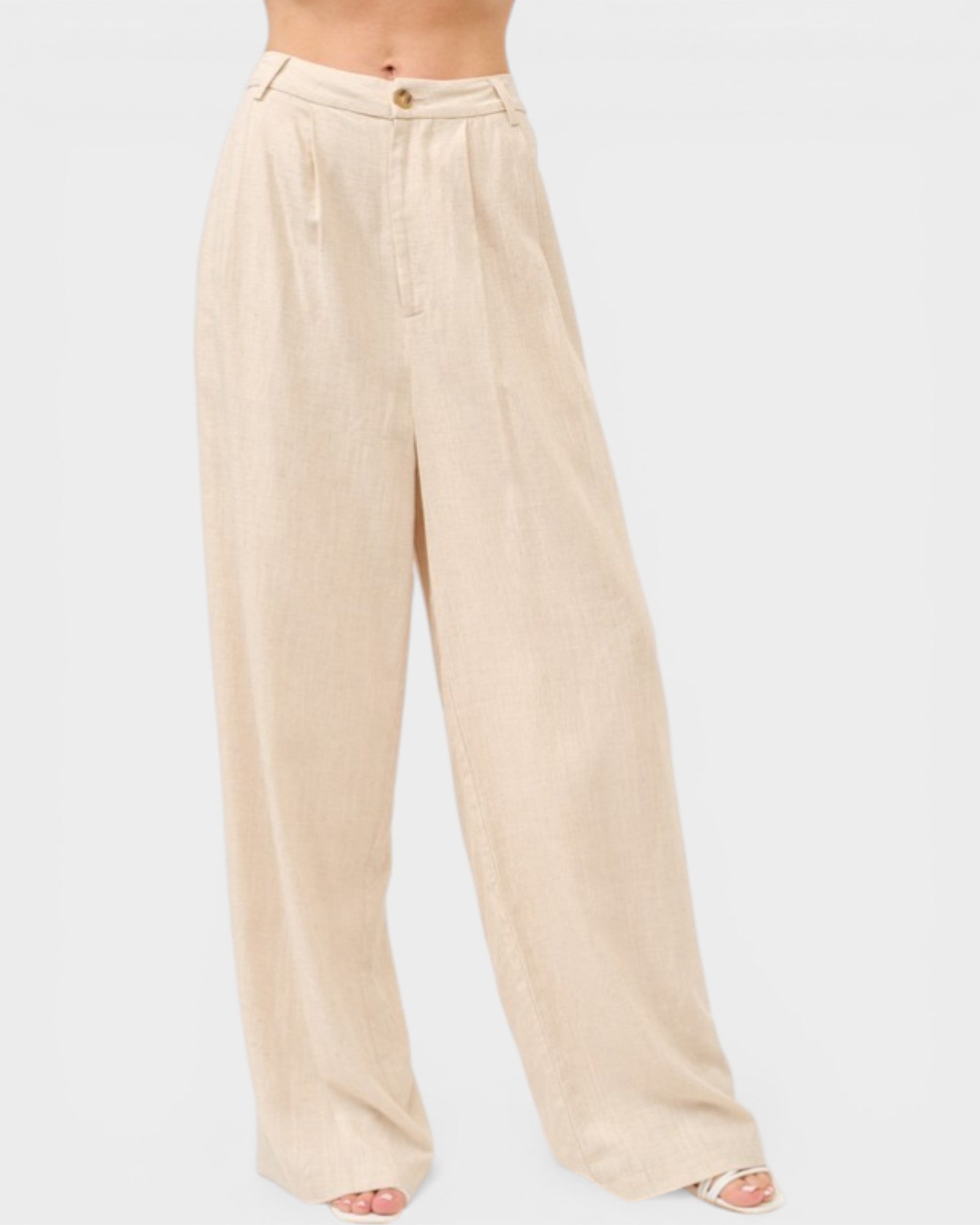 Beige wide-leg pants on a white background