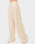 Beige wide-leg pants on a white background