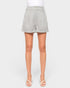 Gray shorts worn by a person on a white background