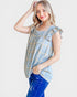 Woman wearing a blue plaid top and blue jeans on a white background