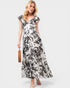Woman wearing a floral dress on a white background