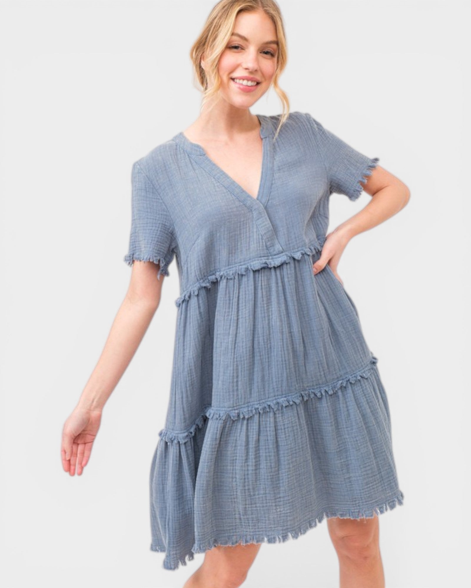Woman wearing a blue dress on a white background