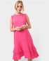 Woman wearing a pink dress on a white background