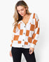 Cardigan boutonné à carreaux et épaules tombantes à col en V en camel