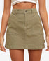 An olive green high-waisted mini skirt with front patch pockets and a button closure, shown on a model against a plain white background.