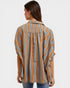 Woman wearing a striped shirt with a white background