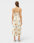 Woman wearing a floral dress on a white background