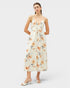 Woman wearing a floral dress on a white background