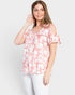 Blusa con hombros descubiertos y estampado floral en color rosa