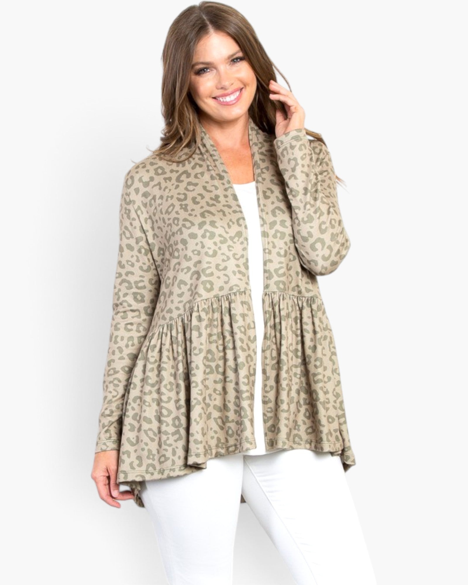 A woman modeling a beige and brown leopard-print cardigan with a peplum waist over a white top and white pants, set against a plain light gray background.