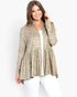 A woman modeling a beige and brown leopard-print cardigan with a peplum waist over a white top and white pants, set against a plain light gray background.