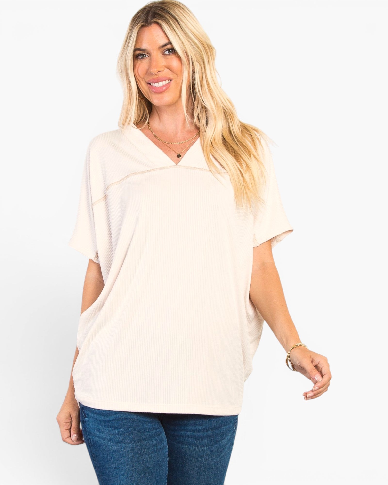 Haut en tricot côtelé à manches courtes et col en V en beige