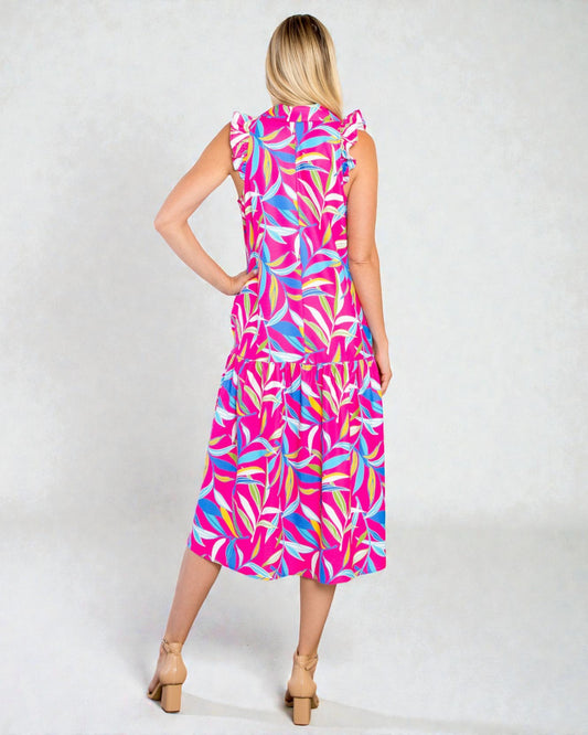 Woman wearing a colorful dress with a white background