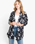 Veste-chemise boutonnée en tricot à imprimé animal noir