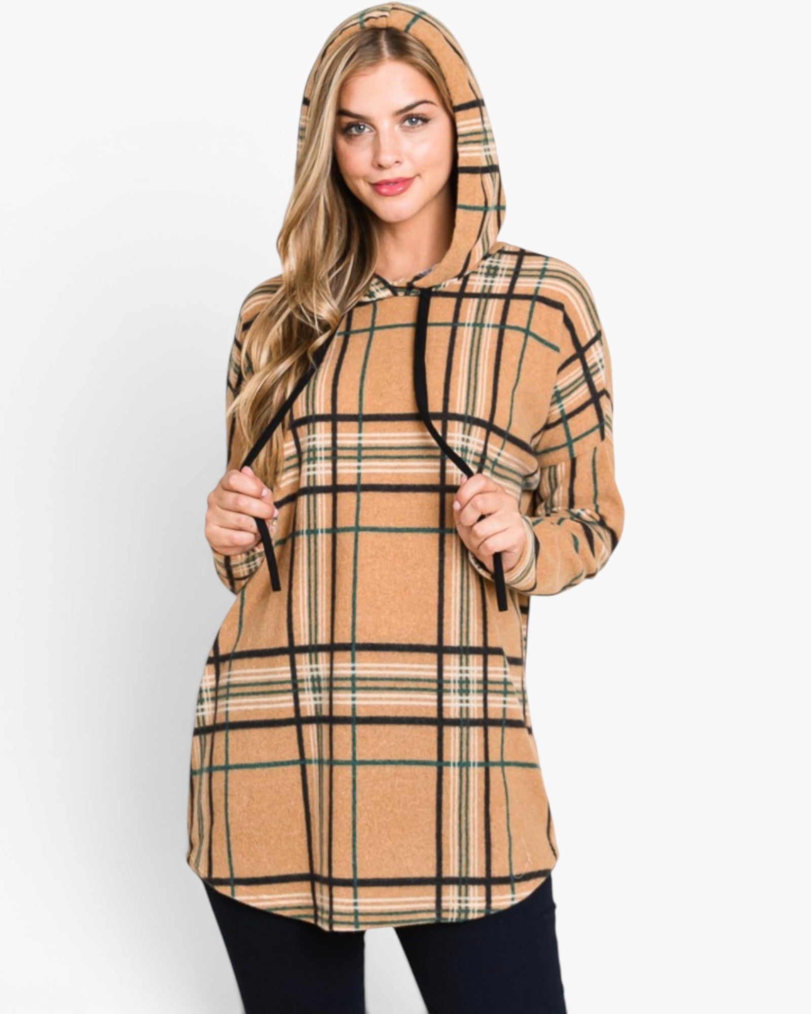 A woman wearing a beige hooded sweatshirt with a brown and black plaid pattern, holding the drawstrings against a plain white background.