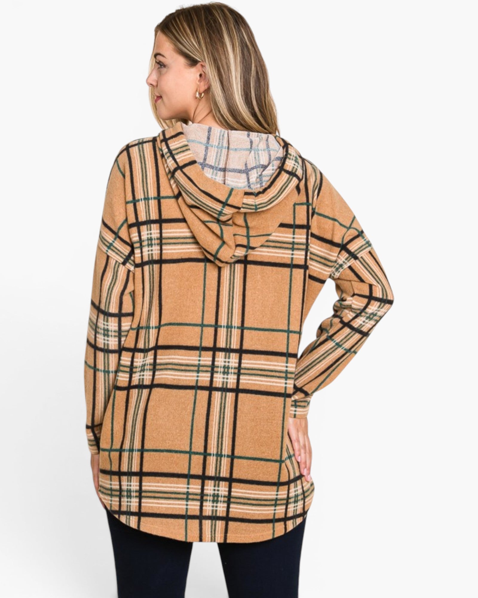 A woman shown from the back wearing a tan plaid hooded sweatshirt with black and green lines, paired with dark pants, against a plain white background.