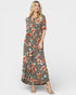 Woman wearing a floral dress on a white background