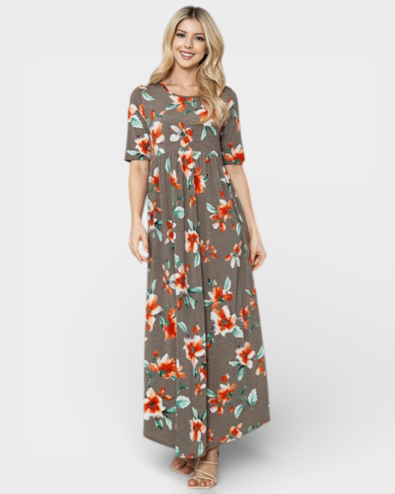 Woman wearing a floral dress on a white background
