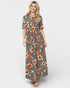 Woman wearing a floral dress on a white background