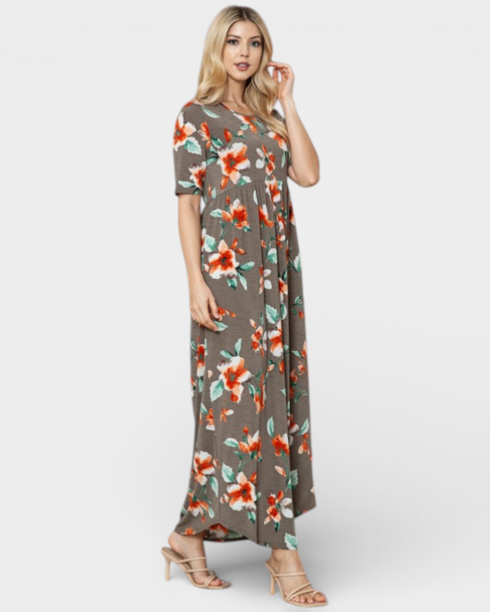 Woman wearing a floral dress on a white background
