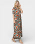 Woman wearing a floral dress on a white background