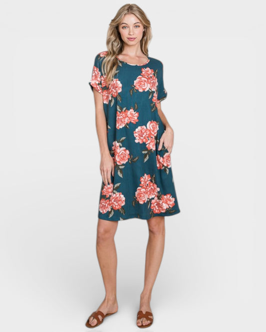 Woman wearing a floral dress on a white background