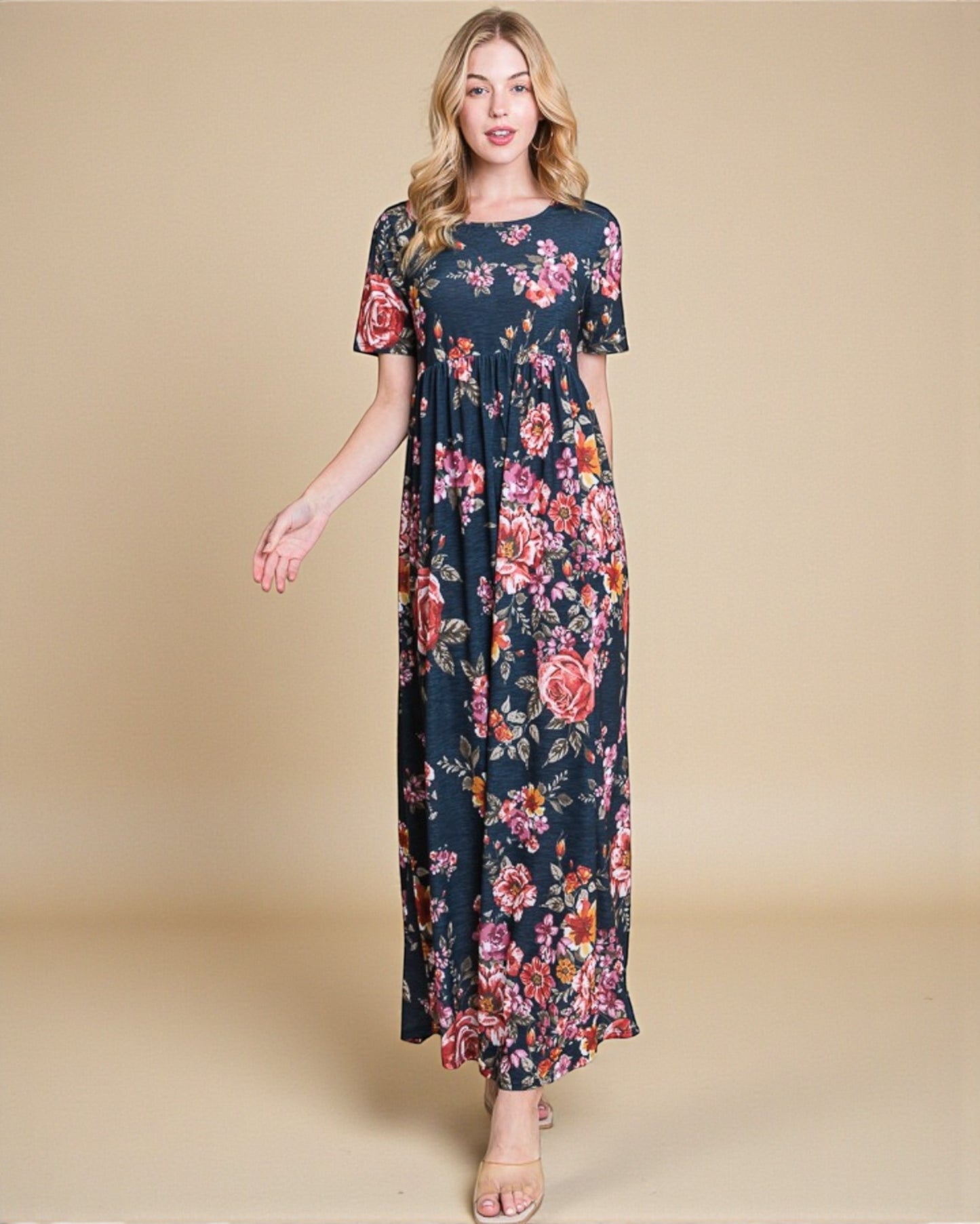 Woman wearing a floral dress on a beige background