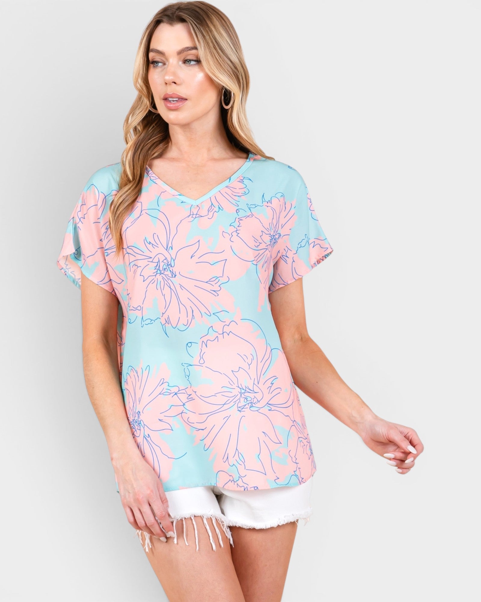 Camiseta de manga corta con estampado floral en color rosa agua