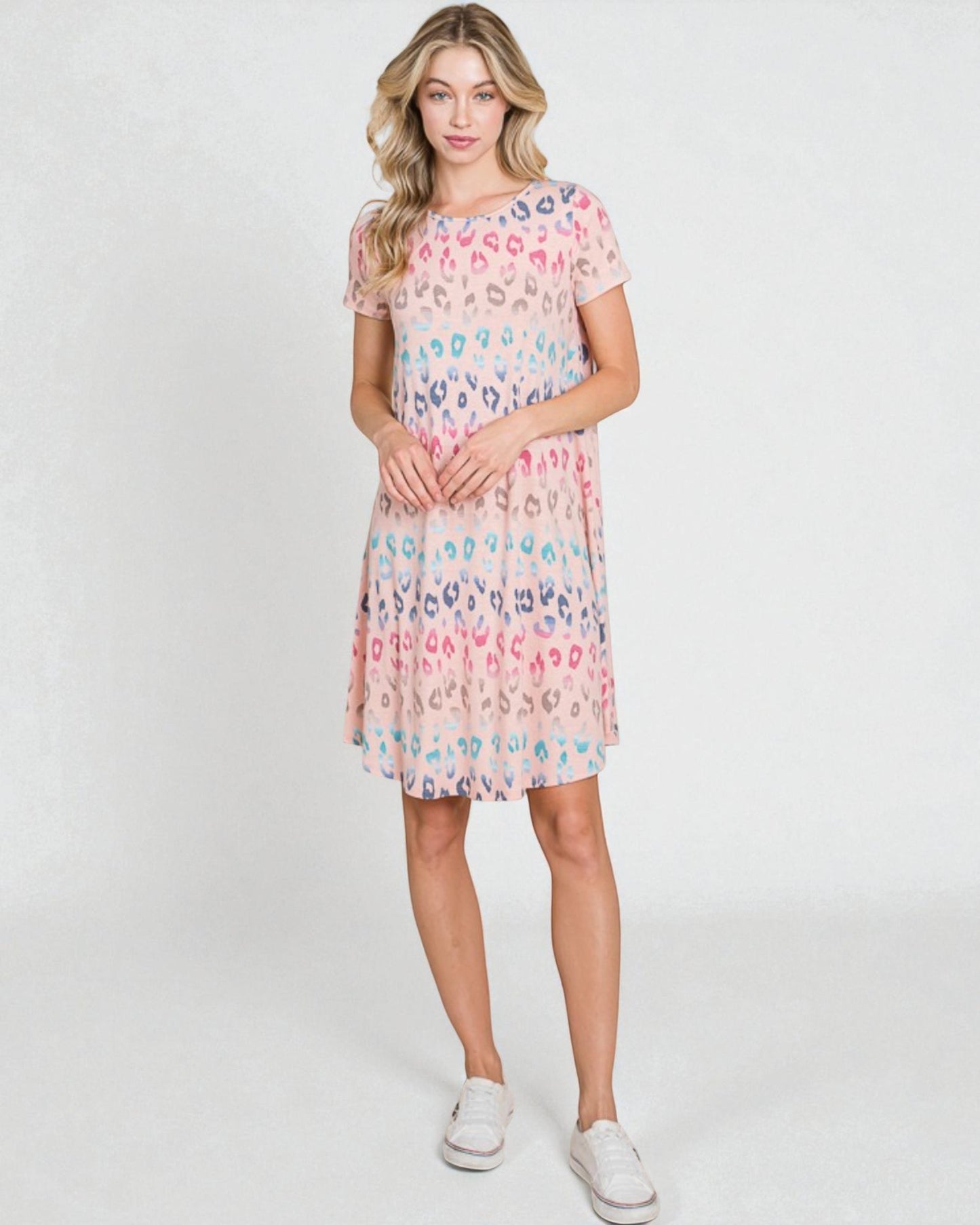 Woman wearing a floral dress on a white background