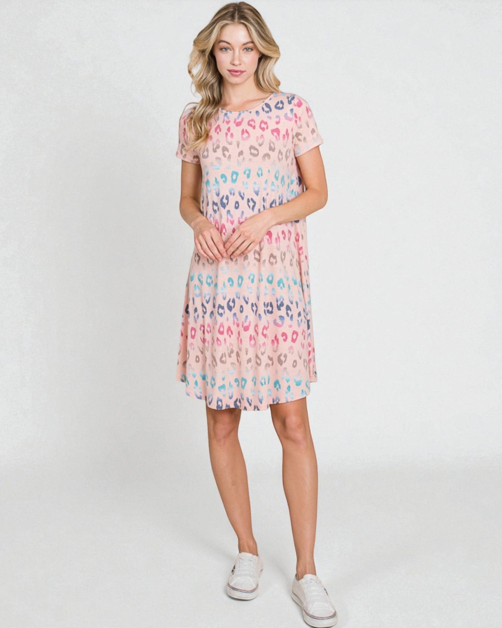 Woman wearing a floral dress on a white background