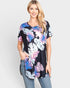 Camiseta túnica de manga corta con estampado tropical en color negro