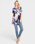 Camiseta túnica de manga corta con estampado tropical en color negro