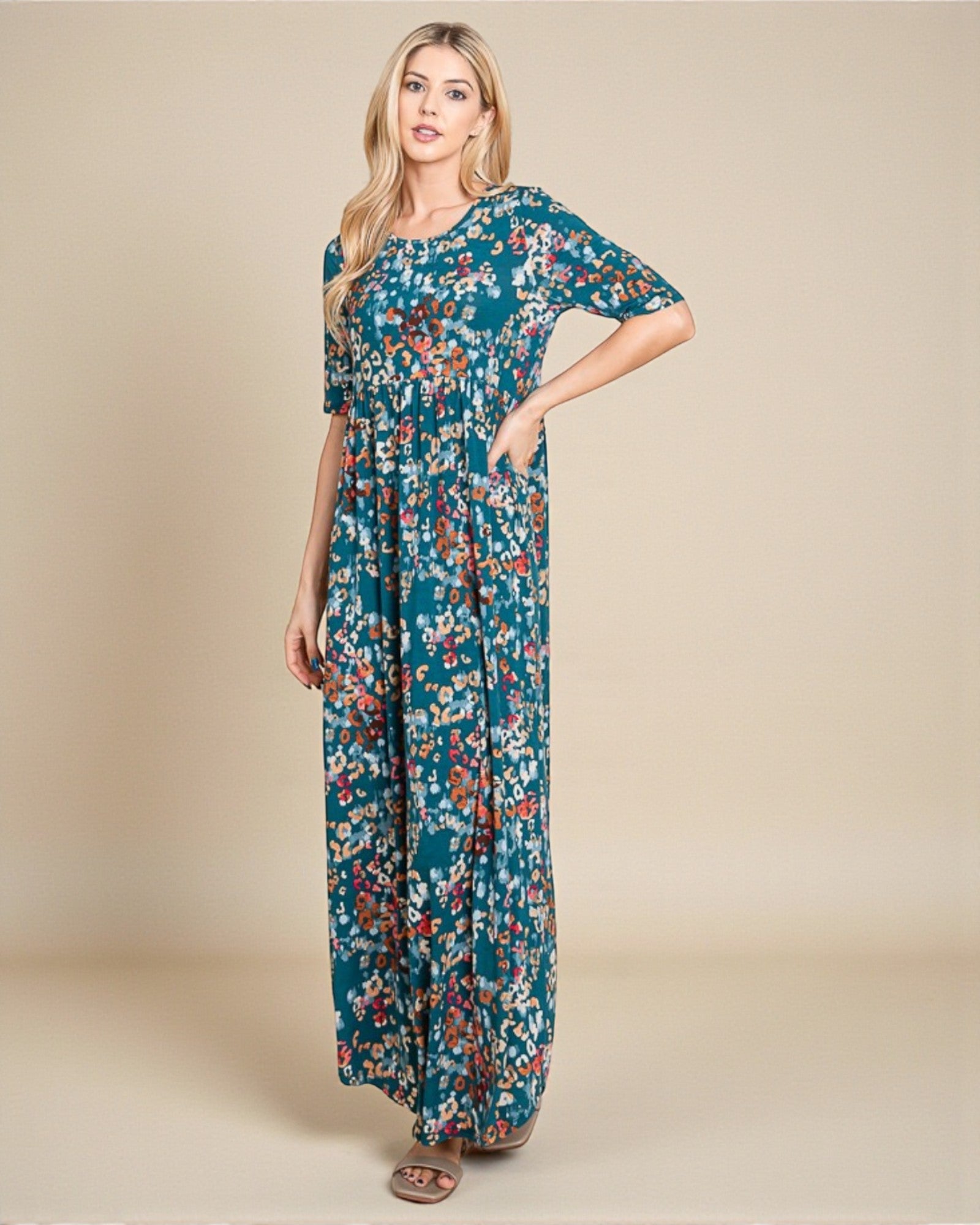 Woman wearing a floral dress on a beige background