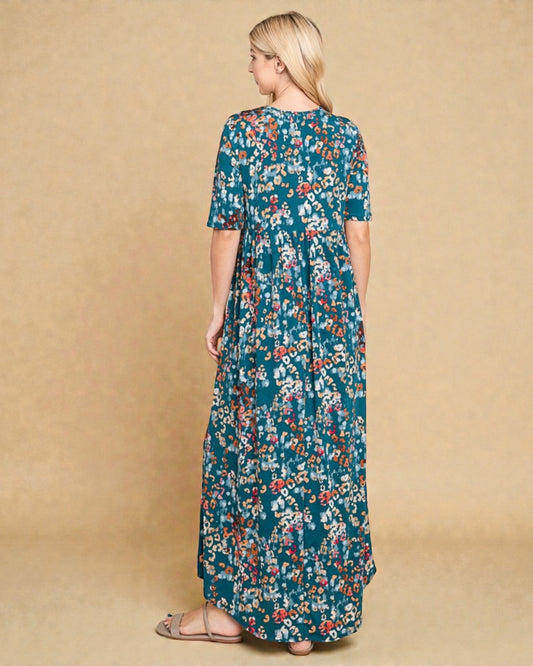 Woman wearing a floral dress against a beige background