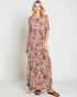 Woman wearing a floral dress on a white background