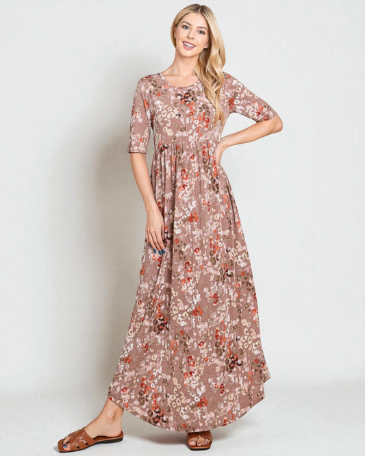 Woman wearing a floral dress on a white background