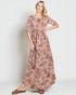 Woman wearing a floral dress on a white background