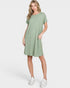 Woman wearing a green dress on a white background